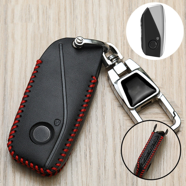 Black key fob cover with red stitched trim and chrome metal keychain buckle