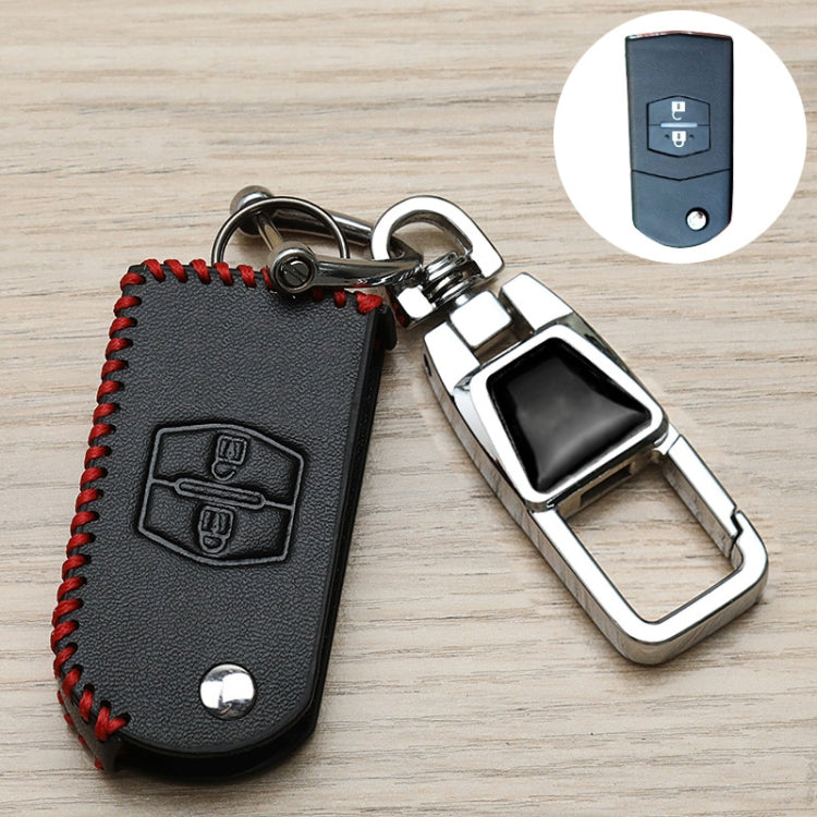 Black leather key fob cover with red stitching and two logo icons on front