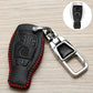 Black leather Mercedes key fob cover with red stitching and chrome metal key ring