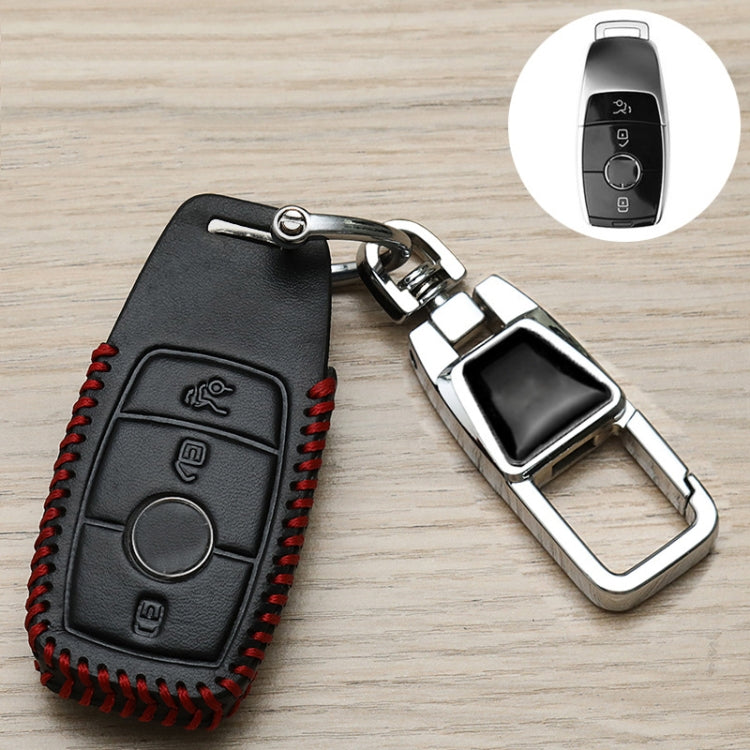 Black key fob cover with red stitched sides and chrome metal clasp keychain