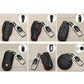 Black leather key fob cover with red stitching shown from multiple angles with metal buckle