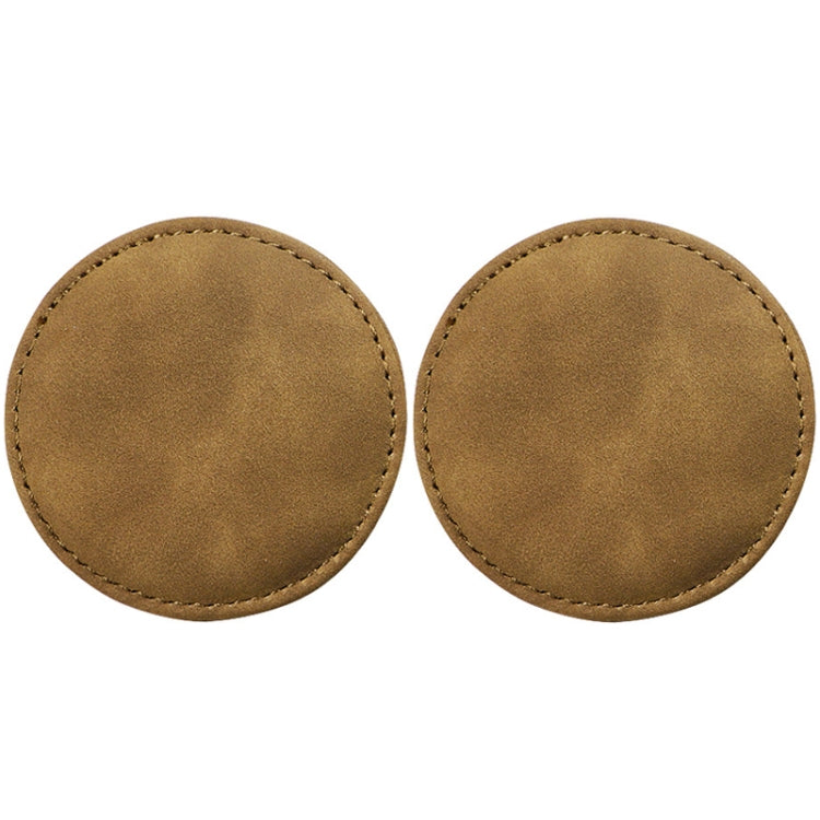 Set of 2 round brown suede car coasters with stitched edges, anti-slip pads.