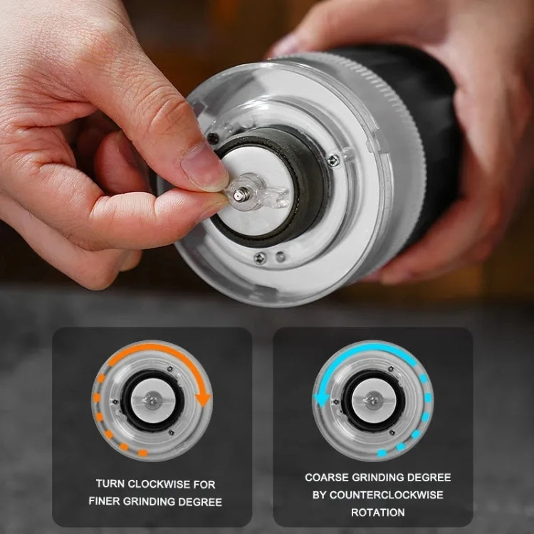 Portable electric coffee grinder with removable base, hands adjusting the grinding dial