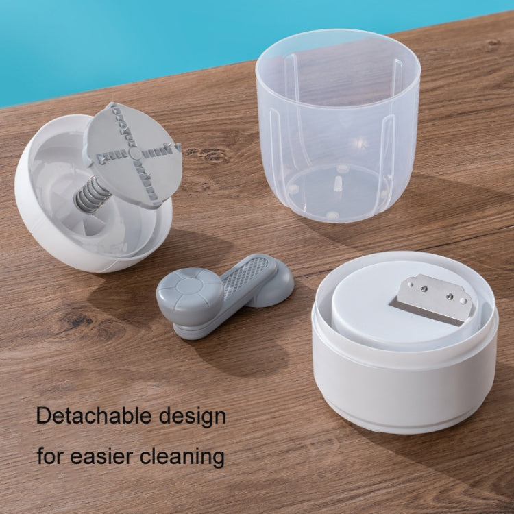 Manual ice shaver with detachable components and transparent crushing chamber for easy cleaning.