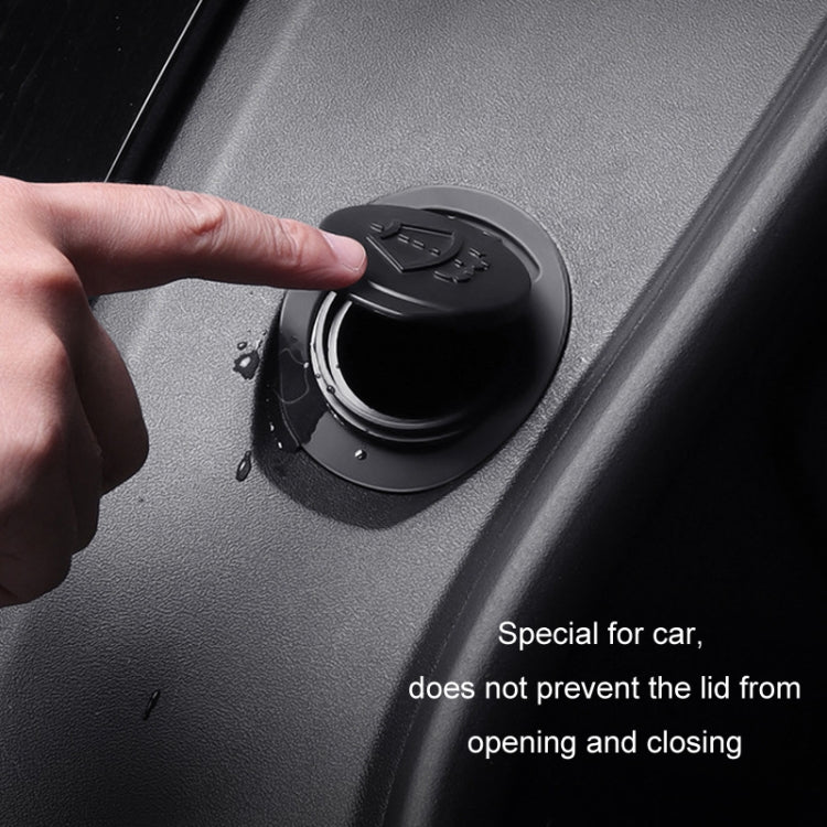 Black wiper filler gap plug installed on car panel opening