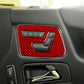 Seat adjustment control panel with red carbon-fiber style stickers, white icon and black handle
