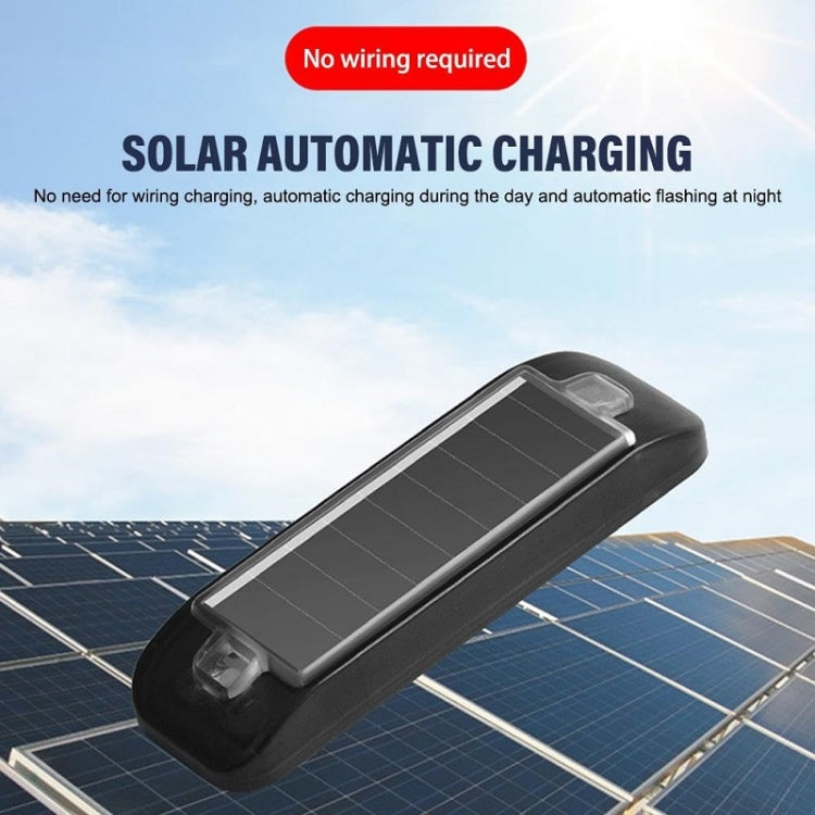 Black solar warning light bar with clear side lens and solar panel top