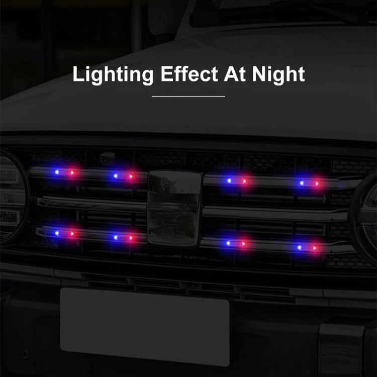Flashing mini solar warning light bar mounted on vehicle grille at night
