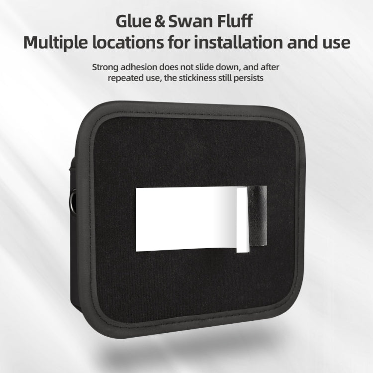 Black adhesive storage bag with visible sticky mounting pad on the front