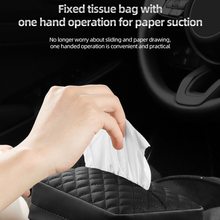 Black quilted car tissue holder with tissues pulled from the top bag