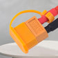 XT60 plug protective cover close-up with orange housing and red/black wire leads