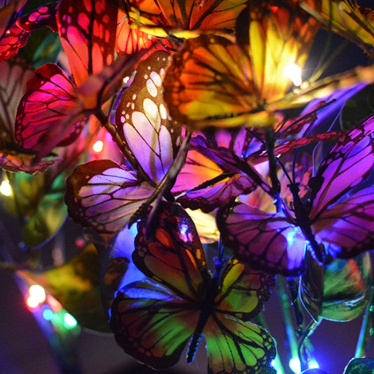 Glowing butterfly flower solar LED garden lights with colorful multicolor illumination
