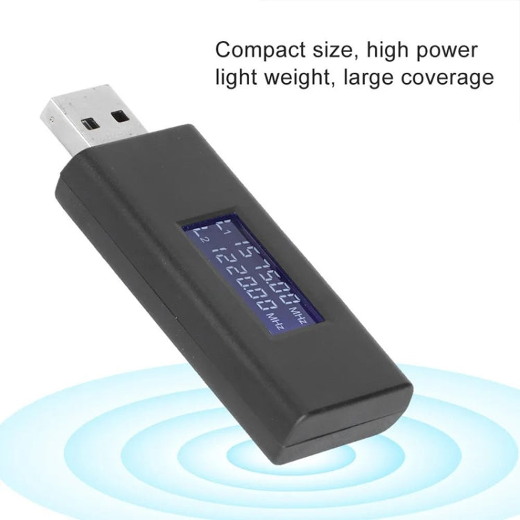 Angled black USB GPS jammer with illuminated LCD screen, compact flash shape