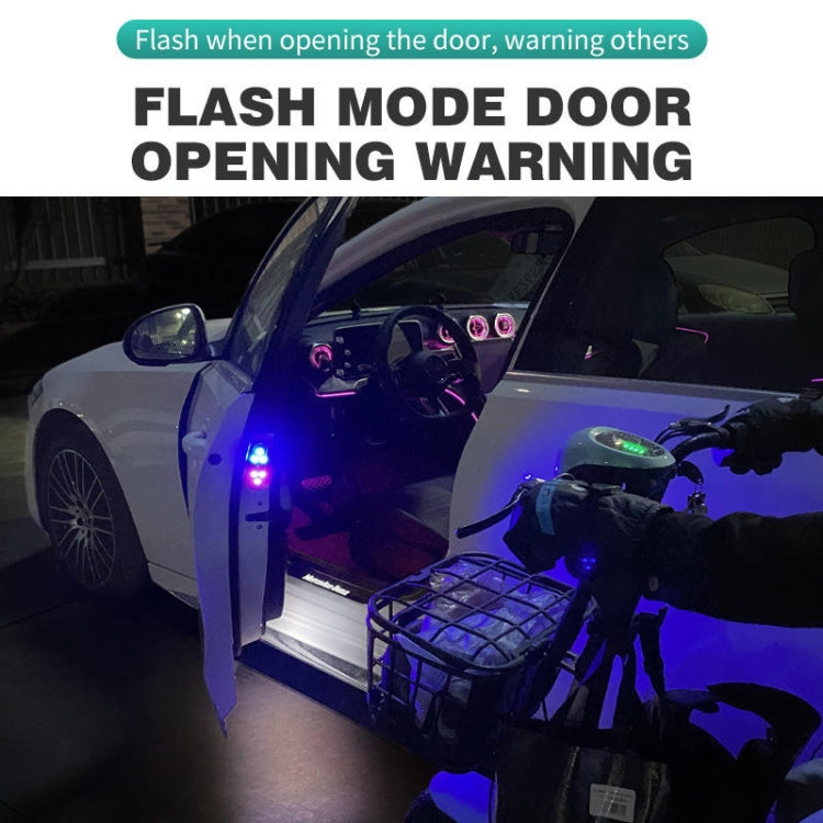 Car door warning light flashing near open car door for visibility at night