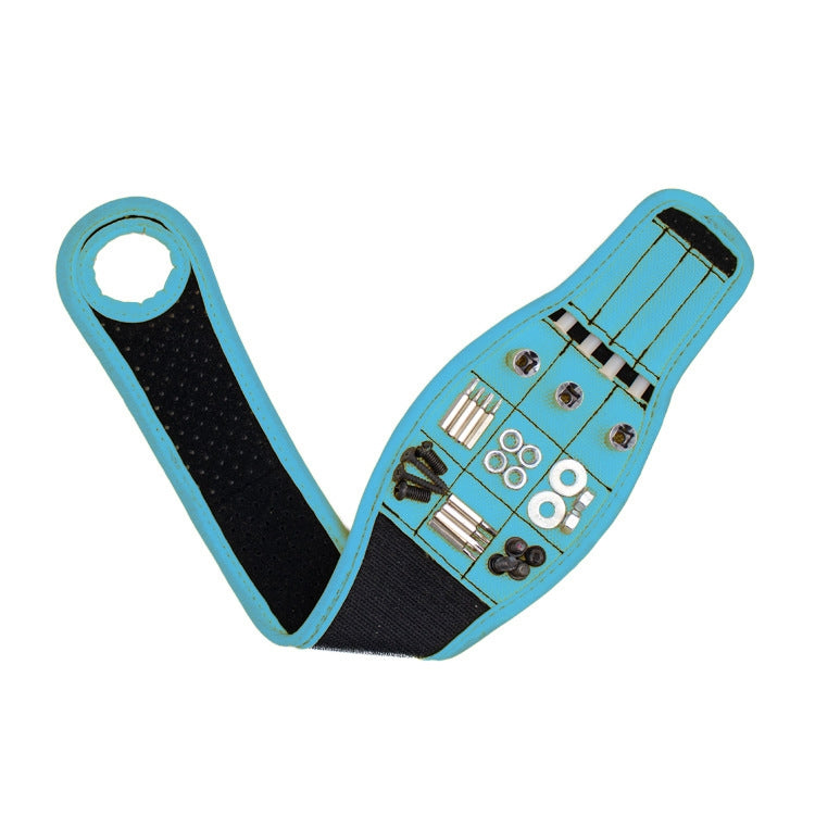 Blue magnetic thumb wrap tool storage strap with black backing and metal tool slots