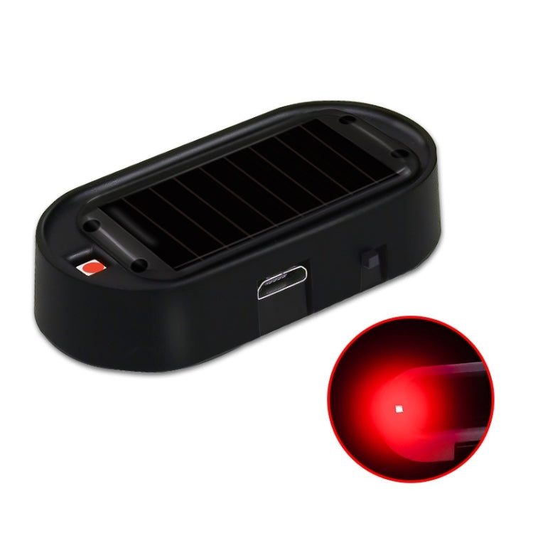 Solar car anti-theft LED warning light, black housing with red LED glow detail