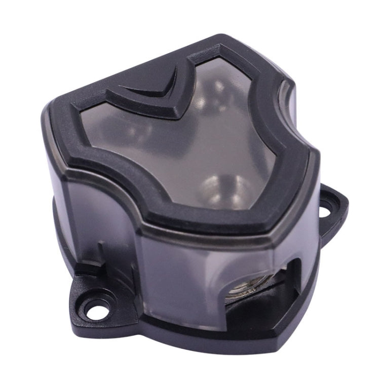 Black fuse holder with clear cover, mounting tabs, and open socket recess