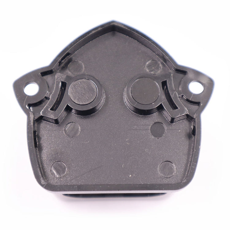 Gray plastic fuse holder base with mounting holes and contact recesses