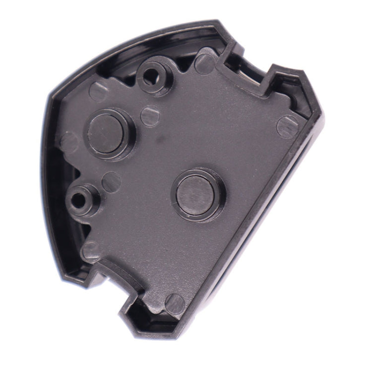 Black plastic fuse hub housing with mounting features and recessed openings