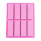 Pink rectangular silicone soap mold with 8 inset cavities and grid lines