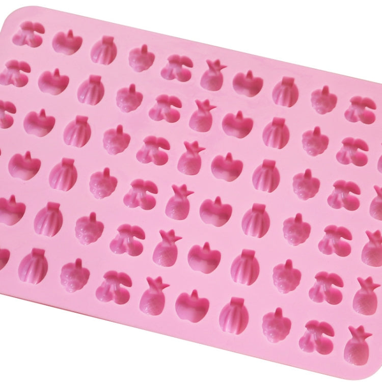 Pink silicone candy mold sheet with fruit, shell, and heart-shaped cavity pattern