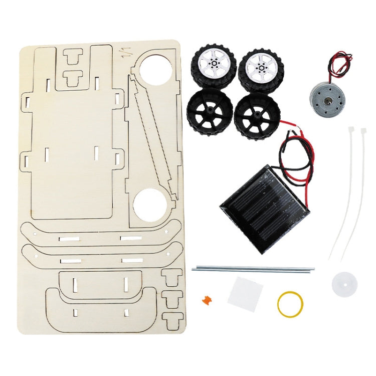 Solar car DIY wooden parts set: cut plywood, wheels, solar panel, motor, and wiring
