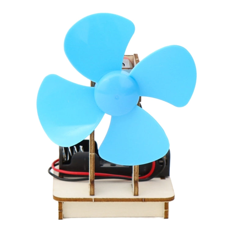 Kids DIY electrical fan science kit close-up: blue three-blade propeller on wooden base