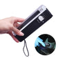 Handheld UV LED curing lamp held in hand, black body with control panel