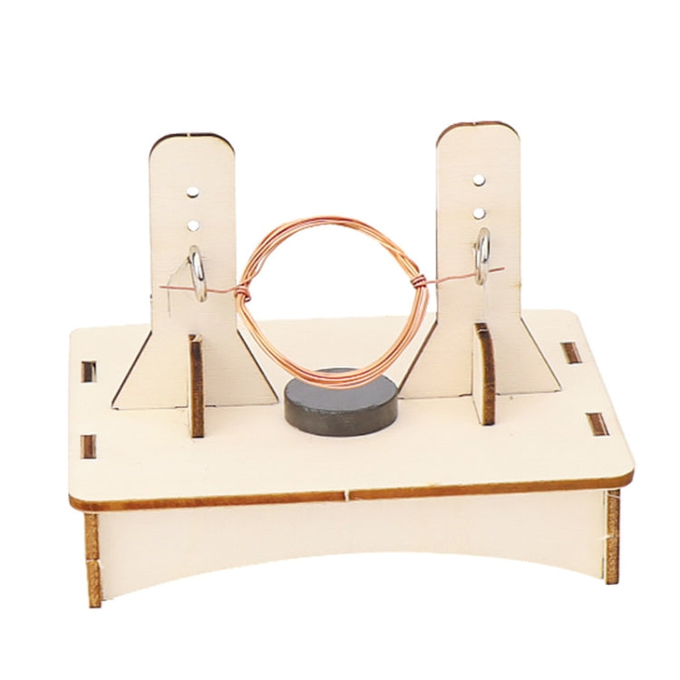 DIY DC motor science experiment board with copper electromagnet coil and two terminals