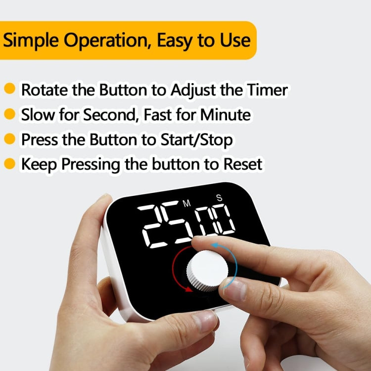 Digital rotating kitchen timer with hands adjusting the dial and LED time digits