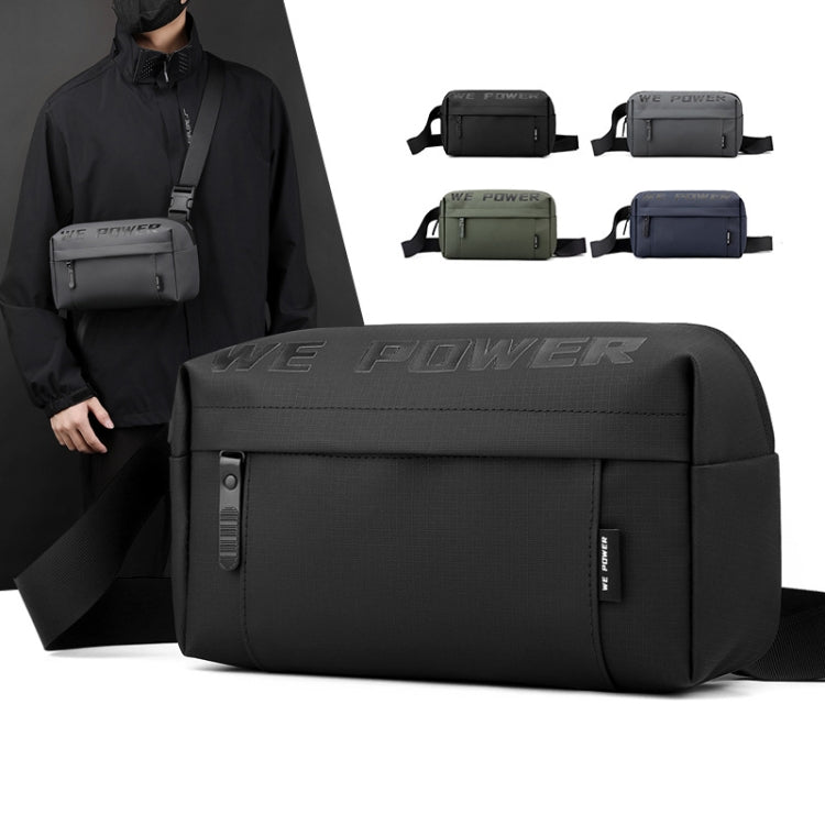 Black men’s chest crossbody bag worn on torso, front zipper pocket and wide adjustable strap