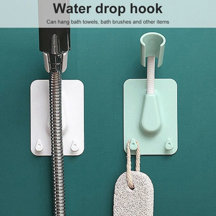 White shower rack with hook base for bath towels and brushes