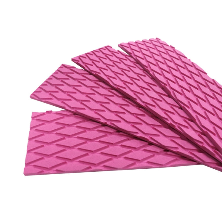 Pink EVA surfboard traction pads with raised diamond anti-slip texture