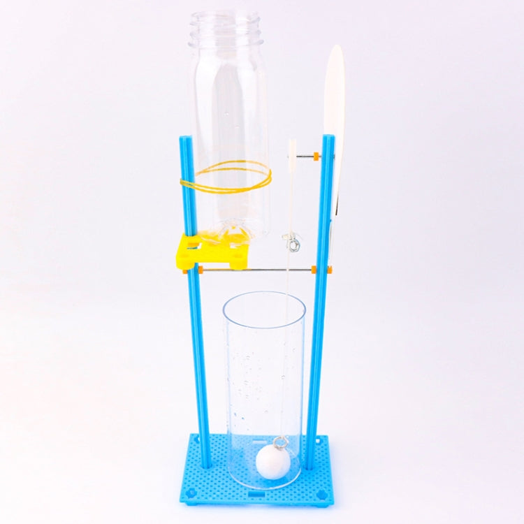 Assembled water-drop clock kit with clear cylinders, blue posts, and yellow pump