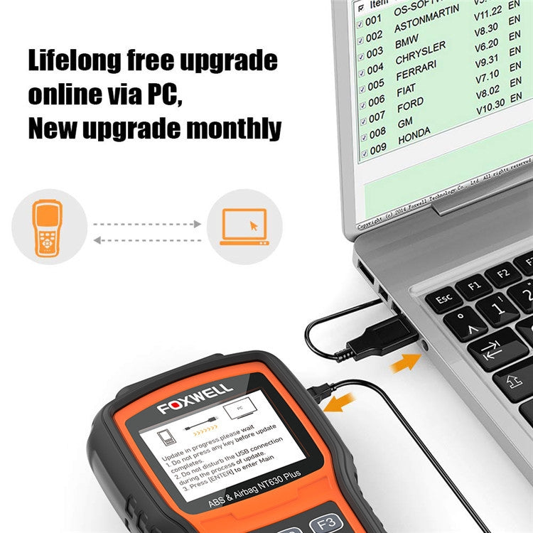 FOXWELL NT630 Plus OBD2 scanner connecting to a laptop for online upgrade