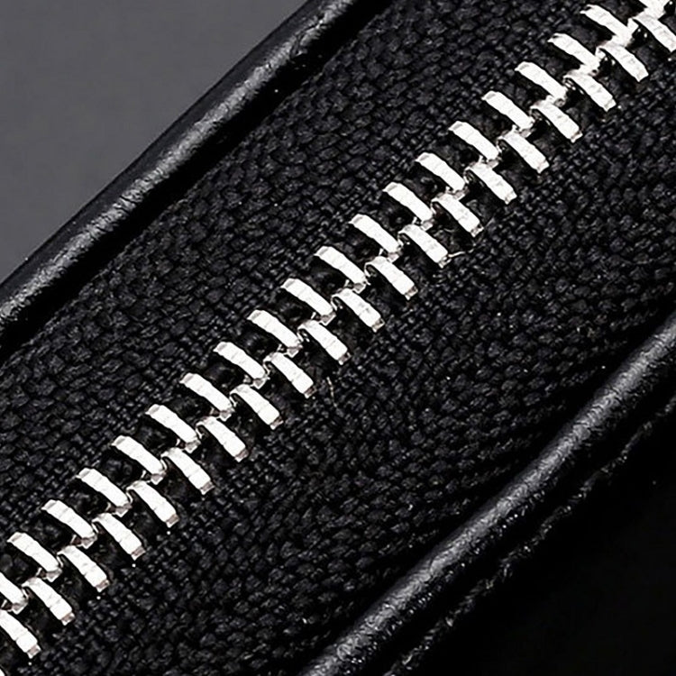 Black zippered key case with close-up of metal zipper teeth