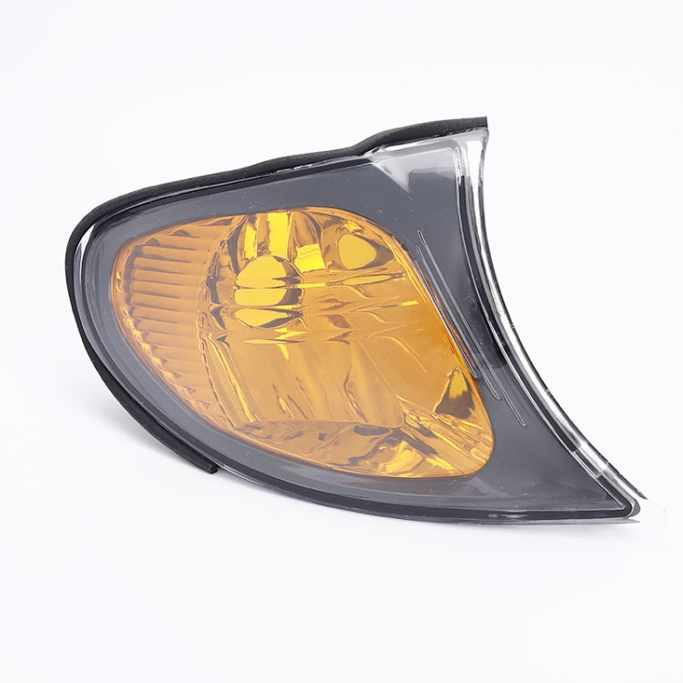 Front corner parking/turn signal light, amber reflector lens with black housing