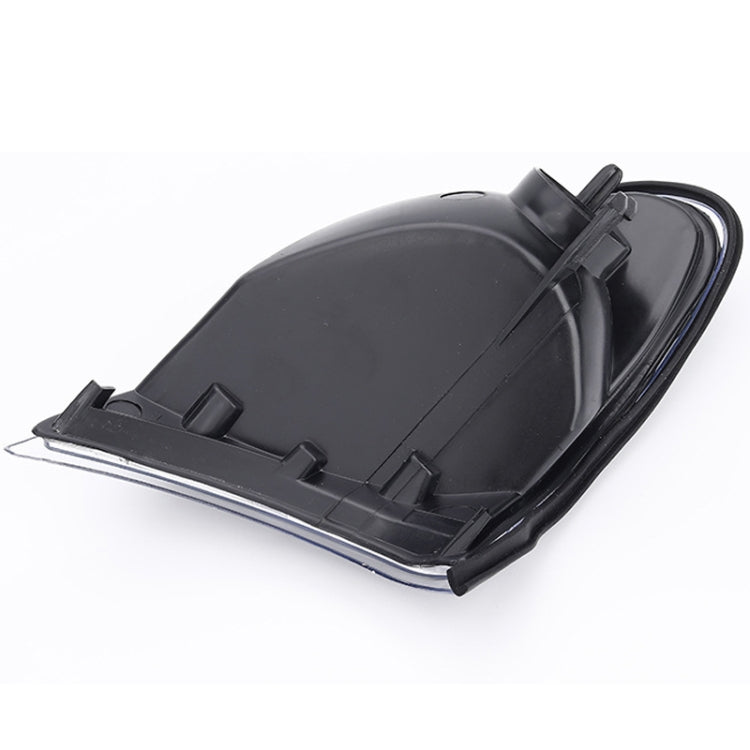 Front corner parking/turn signal light housing, black plastic with mounting tabs