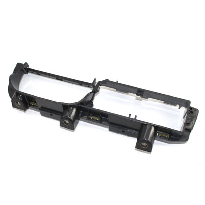 Black plastic window switch panel base bracket with mounting tabs and internal slots