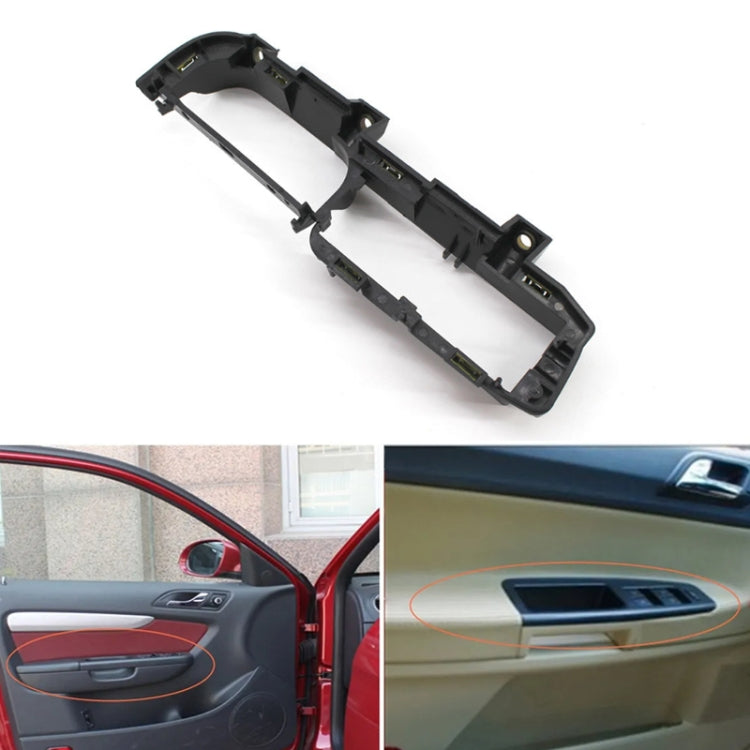 Black window switch panel base bracket shown near car door handle area