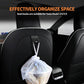 Tesla Model 3/Y rear seat headrest hook holding a clear bag on the back seat.