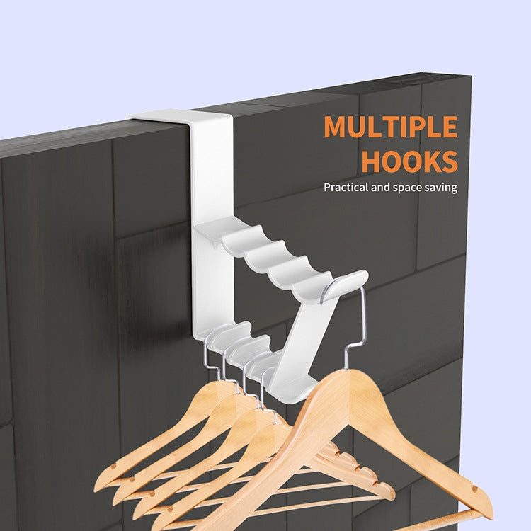 White door back coat hook holding a wooden hanger with multiple items underneath