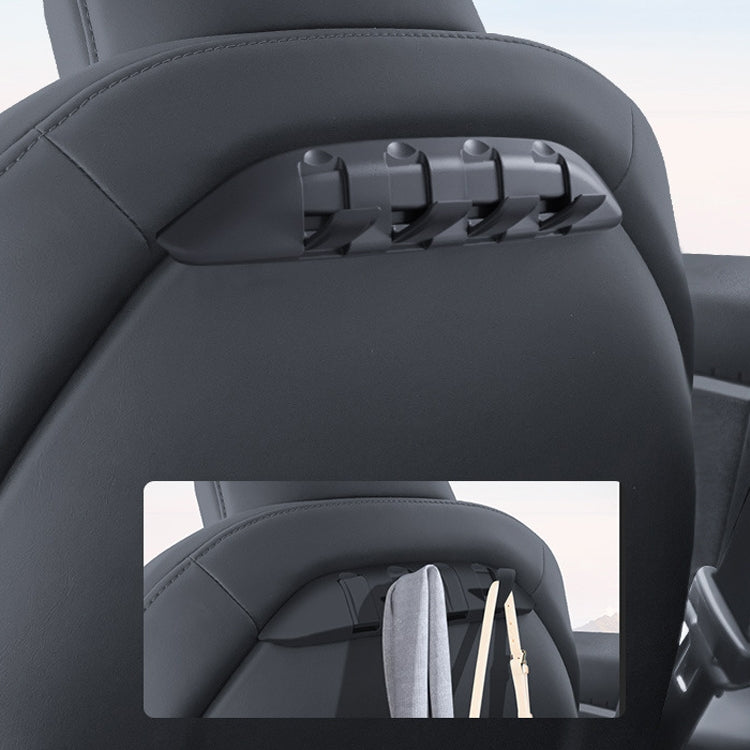 Close-up of multi-hook seat back bracket with several hooks