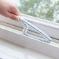 White window trough brush cleaning a frame channel with flexible bristle strips