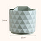 Geometric rotating organizer bucket, light green, 12 cm wide and 14 cm tall