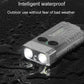 Water-resistant mini keychain flashlight with dual LEDs, compact rectangular black body