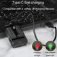 Rechargeable mini flashlight charging via cable, black housing with LED status lights