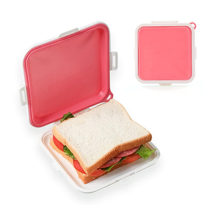 Pink silicone sandwich bread storage box with open lid and sandwich inside
