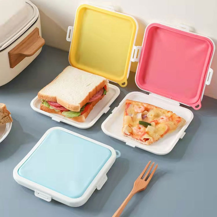Assorted silicone sandwich storage boxes with lids, one containing food