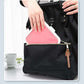 Pink silicone storage box inside a tote bag with lid closed
